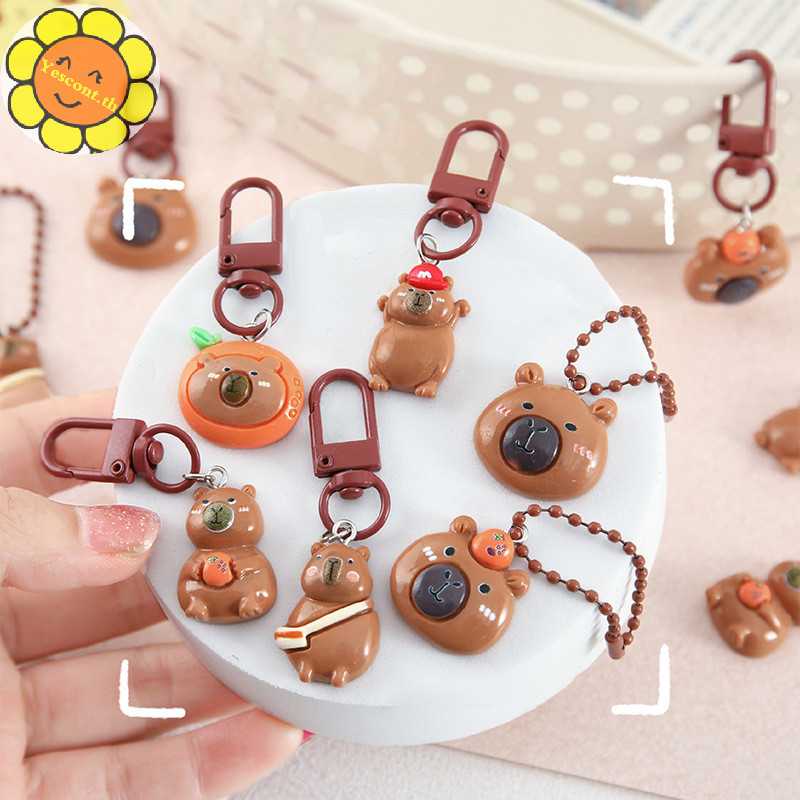 Yescont น่ารักการ์ตูน Capybara พวงกุญแจหูฟังพวงกุญแจรถสําหรับผู้หญิงผู้ชายกระเป๋าเป้สะพายหลังจี้อุปกรณ์ตกแต่งของขวัญเล็กๆ TH