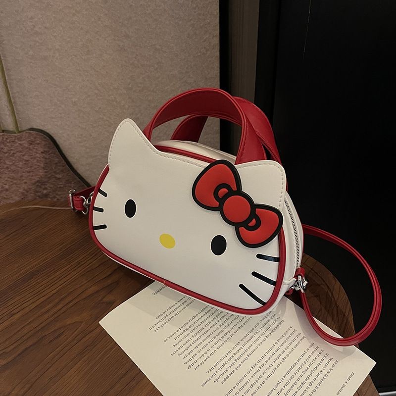 C&k กระเป๋าสะพายไหล่ผู้หญิงน่ารักการ์ตูน Hello Kitty กระเป๋าถือการจับคู่ทุกวัน