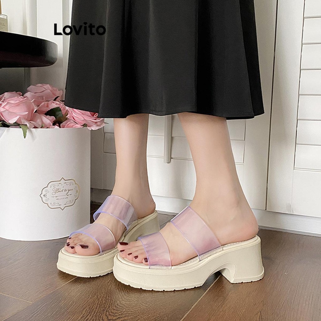 Lovito ลําลองธรรมดาอเนกประสงค์โปร่งใสพื้นหนาเพิ่มความสูงป้องกันการลื่นสวมใส่ด้านนอกรองเท้าแตะแบนสําหรับผู้หญิง  LFA62260