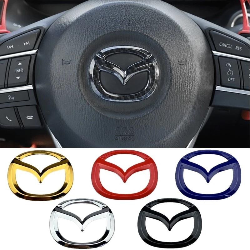 1 PC ABS พวงมาลัยรถศูนย์สติกเกอร์สัญลักษณ์สําหรับ Mazda 3 CX3 CX4 CX5 CX7 CX8 CX9 CX30 RX7 Atenza Ax