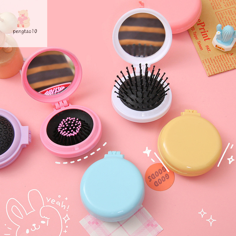 Pengtao10 มินิหวีผมกระจกพับหวีแบบพกพานวดผู ้ หญิงสาวแปรงผม Macaron ถุงลมนิรภัยหวีจัดแต ่ งทรงผมเครื ่ องมือของขวัญใหม ่