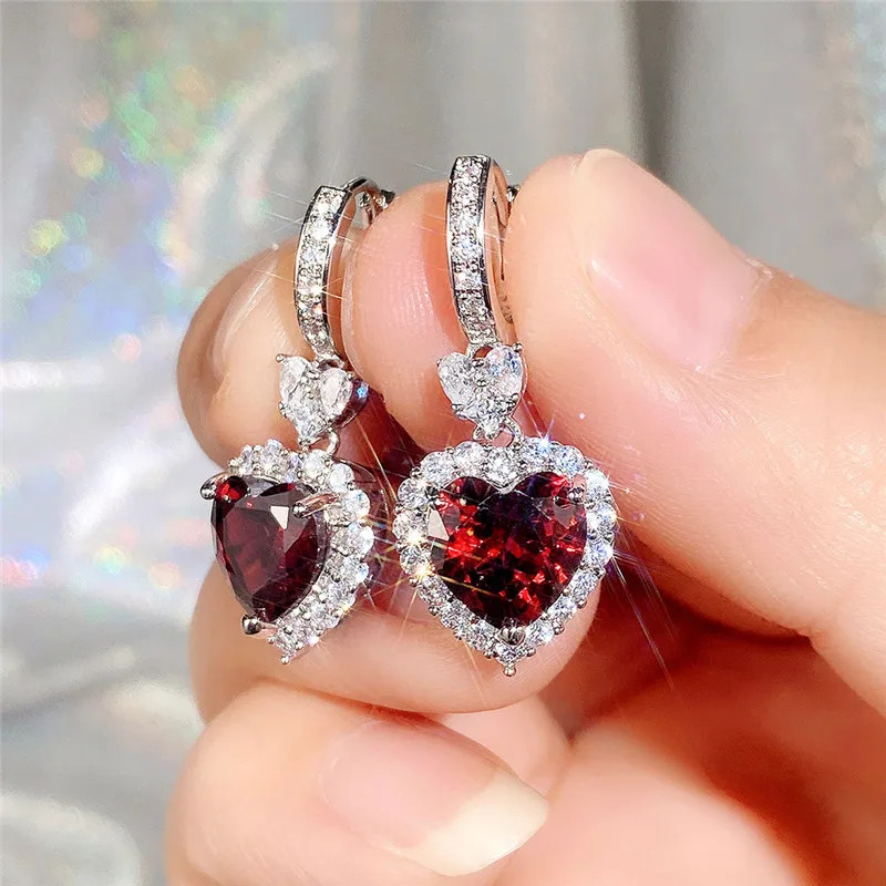925 เงินเข็มสีฟ้า/โกเมนหัวใจ Cubic Zirconia งานแต่งงานต่างหูผู้หญิง Eternity Love ต่างหูหมั้นอุปกรณ์เสริมแฟชั่นเครื่องประดับ