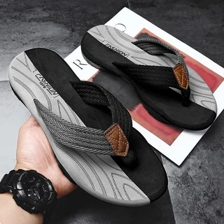 [ส่งจากไทย] รองเท้าแตะผู้ชาย Flip-Flops คุณภาพสูงอินเทรนด์เย็บสองสีเชือกผูกรองเท้า Double-Layer Sole ทนต่อการสึกหรอรองเท้าแตะกันลื่นกีฬาเดินป่า Shock（39-46 หลา）