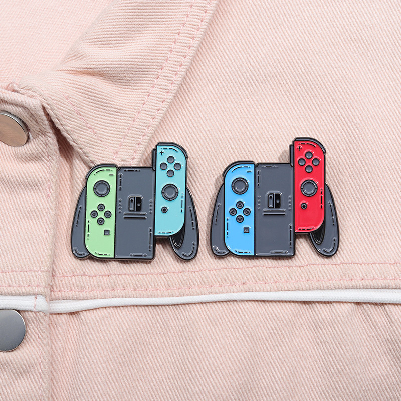 เครื่องเกมคลาสสิกเข็มกลัดโลหะเกมตลกจับเข็มกลัดป้ายโลหะกระเป๋าเป้สะพายหลังเสื้อผ้าอุปกรณ์เสริมของขวัญ