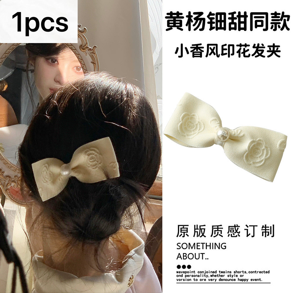 กิ๊บติดผมโบว์คาเมลเลียสีขาวสไตล์คนดังแบบใหม่คลิปด้านข้างอารมณ์แฟชั่น