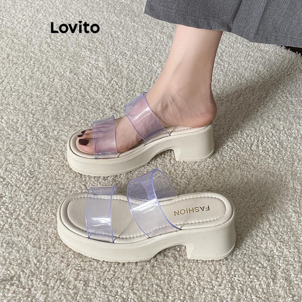 Lovito ลําลองธรรมดาอเนกประสงค์โปร่งใสพื้นหนาเพิ่มความสูงป้องกันการลื่นสวมใส่ด้านนอกรองเท้าแตะแบนสําหรับผู้หญิง  LFA62260