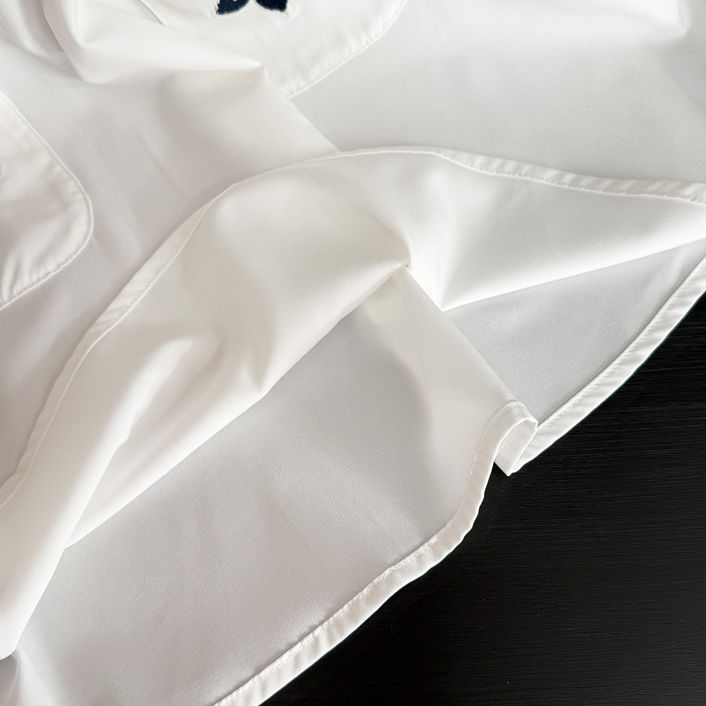 หมีผู้นําเกาหลีรุ่นดอกไม้เย็บปักถักร้อยเสื้อยืดด้านบน + กระโปรงชุดสองชิ้น 3-7 ปีแขนกุดธรรมดาสาวเสื้อผ้า รายา สวมใส่