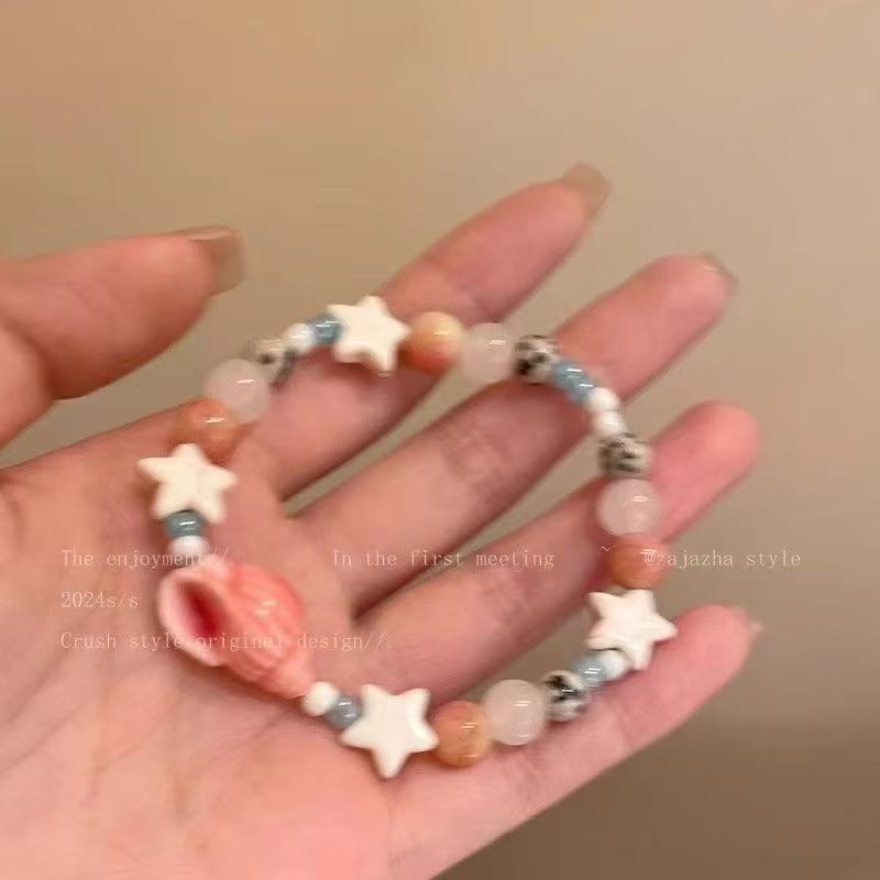 สร้อยข้อมือสไตล์วันหยุดชายทะเล~สร้อยข้อมือลูกปัดเซรามิกดาวแหลมหญิง