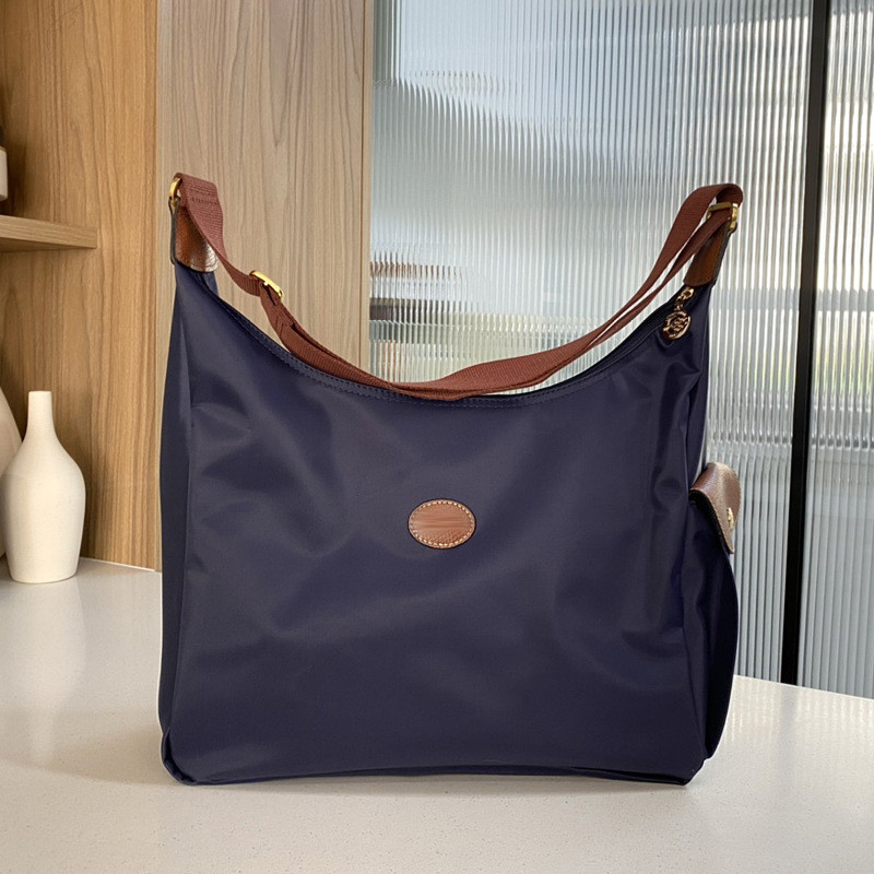 2025 สไตล์ใหม่ Commuter หญิงกระเป๋า hobo ไนลอน Crossbody กระเป๋าหญิง Retro Messenger กระเป๋าสะพายขนาดใหญ่ความจุกระเป๋าแม่เด็ก Dumpling กระเป๋า