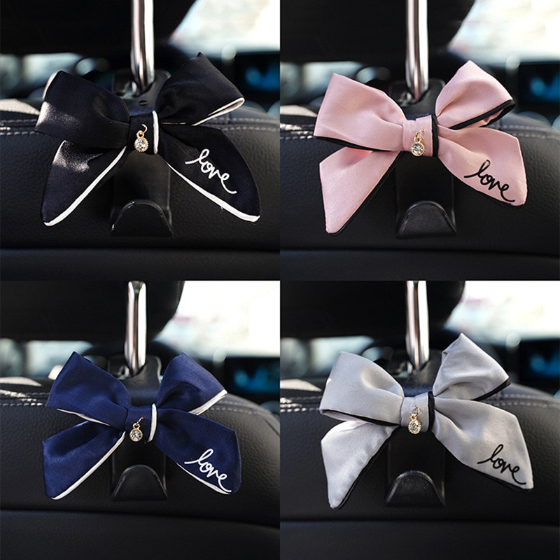 น ่ ารักโบว ์ รถHook Headrest Groceryกระเป ๋ ารถอุปกรณ ์ ตกแต ่ งภายในรถที ่ นั ่ งพนักพิงHookอุปกรณ ์ เสริมในรถยนต ์