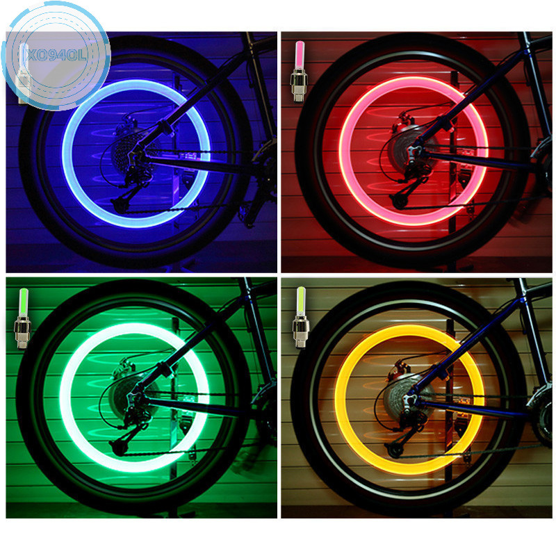 Xo94ol Neon Bike Spoke Light แผนที ่ จักรยานยางรถหัวฉีดวาล ์ วหมวกโคมไฟจักรยานอุปกรณ ์ ขี ่ จักรยาน TH