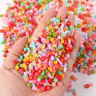 100ชิ้นที่มีสีสันมินิผสมดอกไม้แบนกลับเรซิ่นดอกไม้การ์ตูน ทําเอง เครื่องประดับเสน่ห์หัตถกรรมตกแต่งสาวตกแต่งเล็บ
