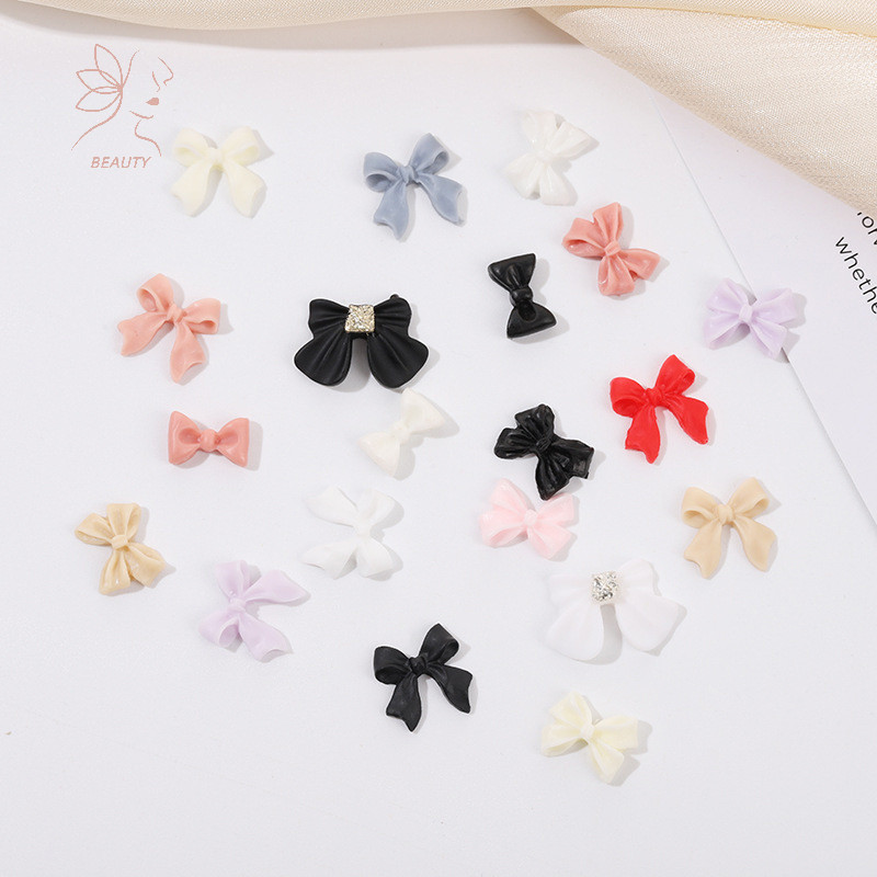 [maybeauty] 50pcs ริบบิ้นเรซิ่นโบว์เล็บ Charm อะไหล่ 3D Rhinestone เล็บอุปกรณ์ตกแต่งอุปกรณ์สําหรับ DIY เกาหลีเล็บออกแบบ {TH}