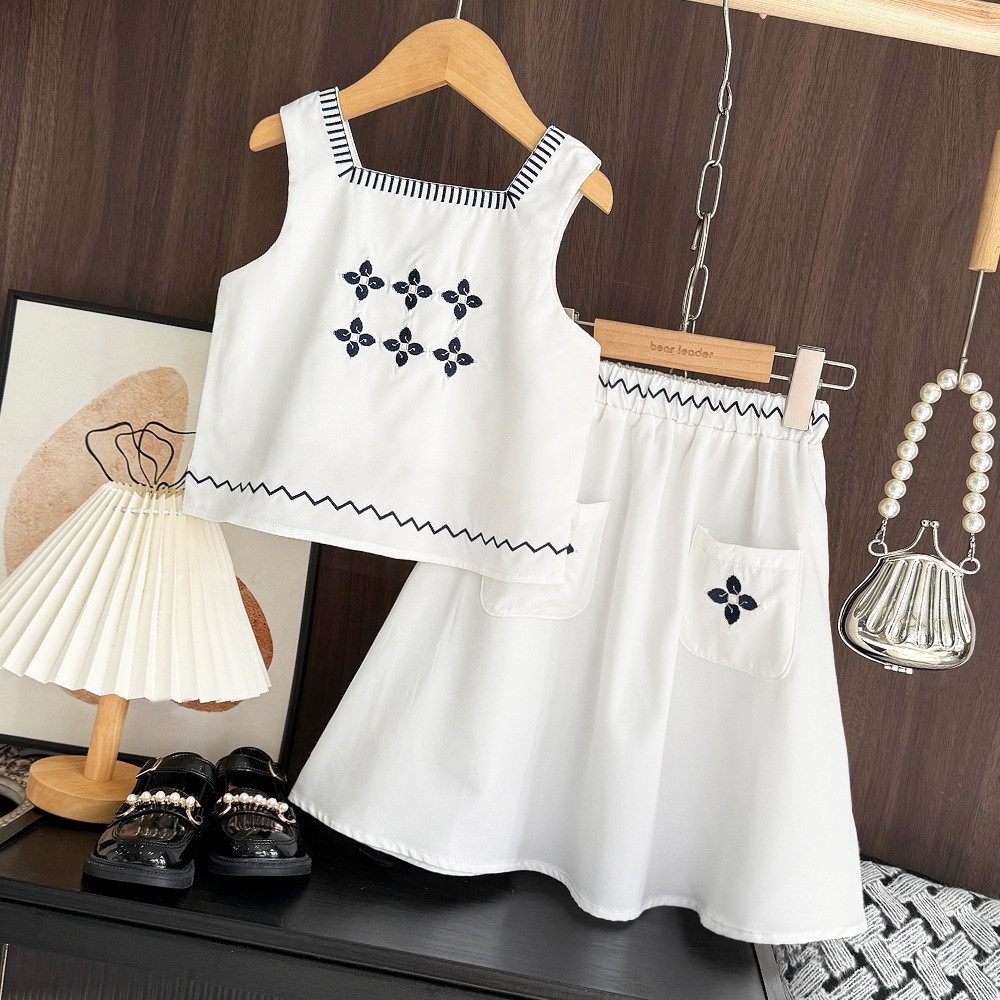 หมีผู้นําเกาหลีรุ่นดอกไม้เย็บปักถักร้อยเสื้อยืดด้านบน + กระโปรงชุดสองชิ้น 3-7 ปีแขนกุดธรรมดาสาวเสื้อผ้า รายา สวมใส่