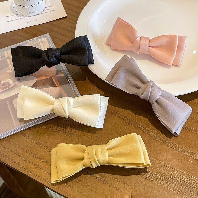 2025 โบว์กิ๊บติดผมขนาดเล็กหญิงระดับไฮเอนด์ซาตินฤดูใบไม้ผลิคลิปแบน