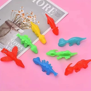 10 ชิ้นไดโนเสาร์นิ้วมือ Catapult Decompression ของเล่น TPR ตุรกีนิ้วมือ Slingshot สําหรับเด็กวันเกิด Party Favors Goodie กระเป๋า
