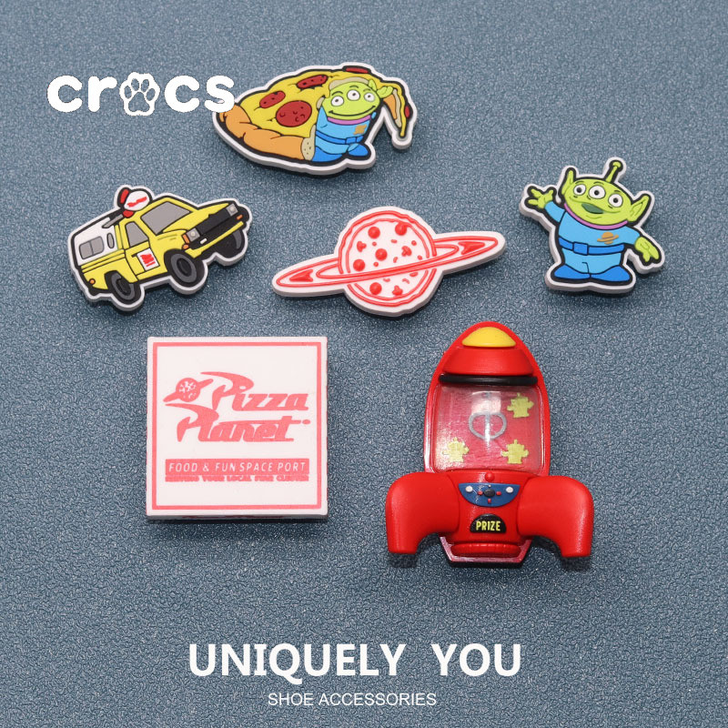 Crocs JIbbitz กัปตันอเมริกา JIbbitz Pizza Planet รองเท้าหัวเข็มขัด charm Crocs การ์ตูนโบว์อุปกรณ์เสริมรองเท้า