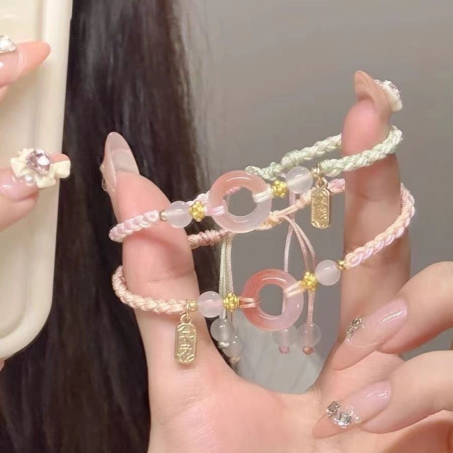 สร้อยข้อมือดอกพีชสีชมพูสีจับคู่ที่สวยงามเชือกมือคู่ปลอดภัยสร้อยข้อมือมีความสุขเชือกมือโชคดีเชือกสีแดงสร้อยข้อมือเชือกมือถัก