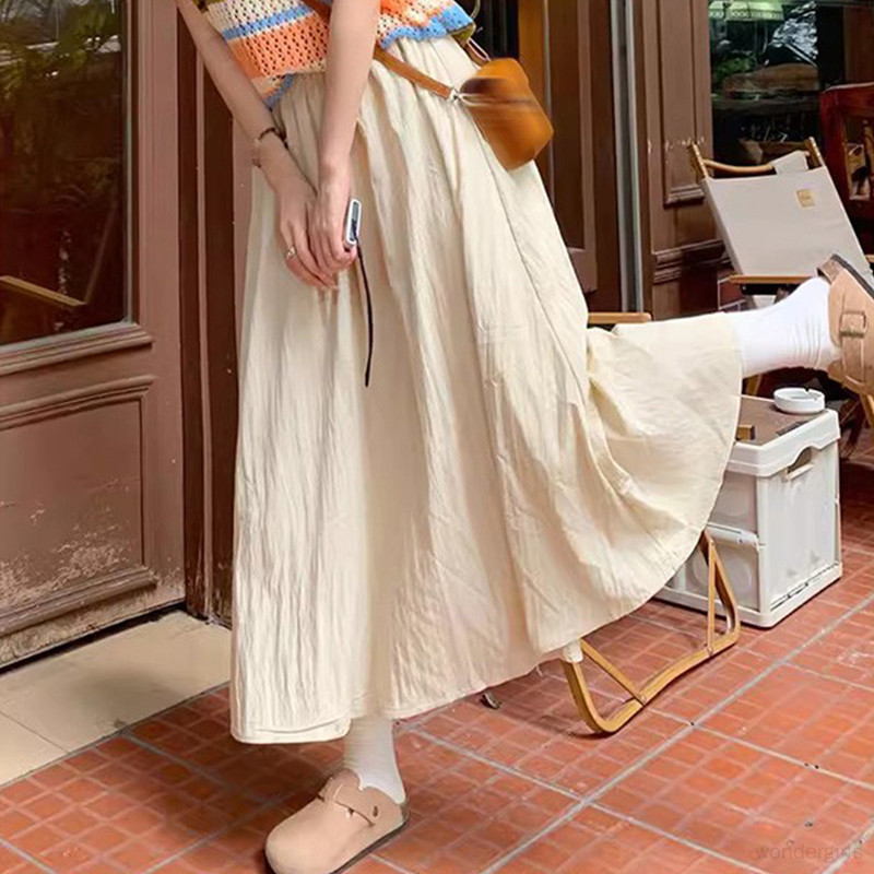 กระโปรงเอวสูงเกาหลีผู ้ หญิงเกาหลีสีทึบอเนกประสงค ์ ขี ้ เกียจสไตล ์ A-line กระโปรงยาว
