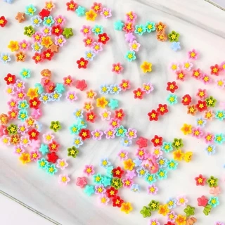 100ชิ้นที่มีสีสันมินิผสมดอกไม้แบนกลับเรซิ่นดอกไม้การ์ตูน ทําเอง เครื่องประดับเสน่ห์หัตถกรรมตกแต่งสาวตกแต่งเล็บ