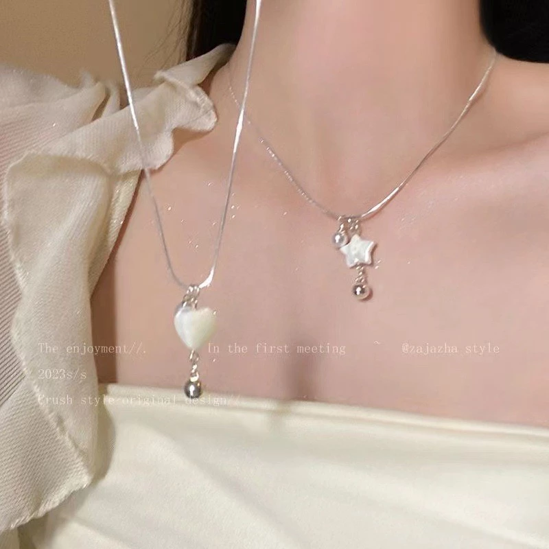 💝เครื่องประดับผู้หญิง💝สร้อยคอจี้เปลือกหอยมุกดาวห้าแฉก&หัวใจ สไตล์เกาหลีสีเงินโซ่ไหปลาร้าไม่ตกสี N196