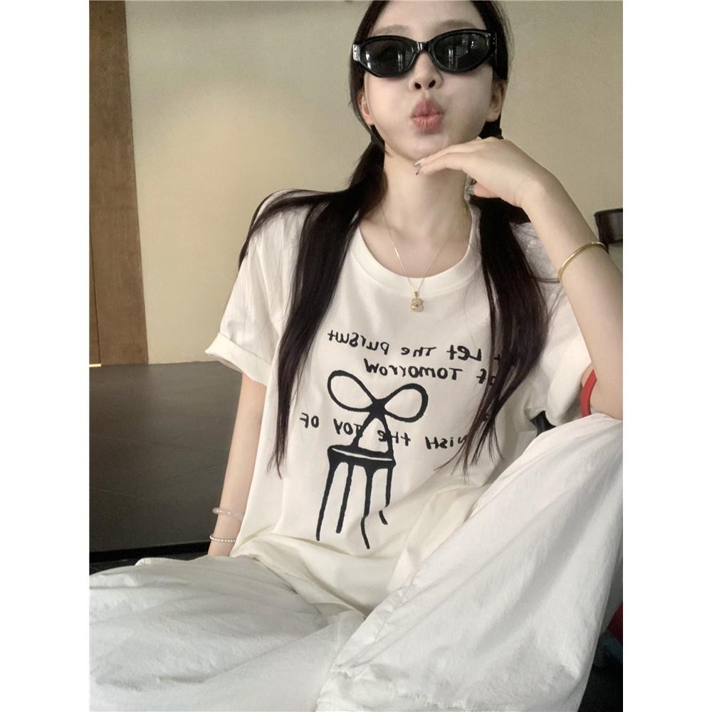 Papaya เสื้อยืดโอเวอร์ไซส์ เสื้อยืดเกาหลี ผ้าคอตตอน100% เสื้อยืด ริบบิ้นกราฟฟิตีสีดำ ใส่สบายจ้า เนื้