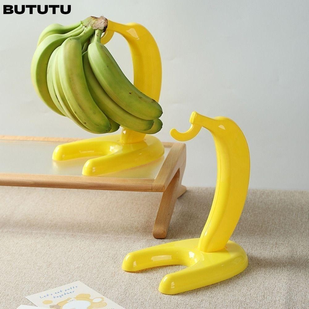 Bututu ตะขอแขวนผลไม้ รูปกล้วย สีเหลือง ปลอดสารพิษ สร้างสรรค์ สําหรับตกแต่งบ้าน