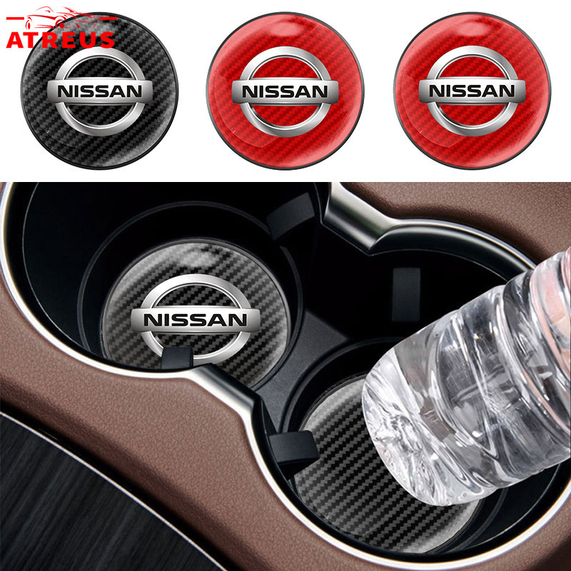 1ชิ้น Nissan แผ่นรองแก้วน้ําในรถยนต์ คาร์บอนไฟเบอร์แผ่นรองแก้วน้ําในรถยนต์ กันลื่น แผ่นรองแก้วเครื่องดื่ม สำหรับ Nissan Kicks 2022 Note Almera Terra Navara nismo xtrail t32 t33 March Teana Leaf Juke Sylphy