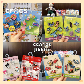 Crocs Jibbitz ชุดหัวเข็มขัดรองเท้าการ์ตูน แฟชั่นอุปกรณ์เสริมรองเท้า charm crocs หัวเข็มขัดรองเท้า Pokémon น่ารัก KT ดอกไม้รองเท้าแมว
