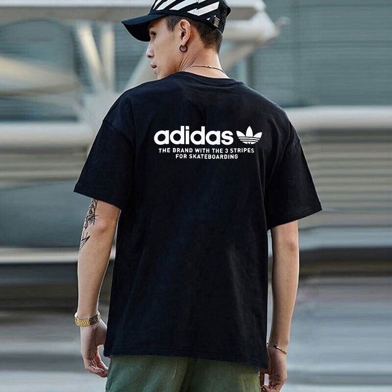 พร้อมส่ง เสื้อยืดแขนสั้นลําลอง ผ้าฝ้าย พิมพ์ลายโลโก้ ADI ทรงหลวม ขนาดใหญ่ คุณภาพสูง แฟชั่นฤดูร้อน สําหรับทุกเพศ ไซซ์ XS-3XL