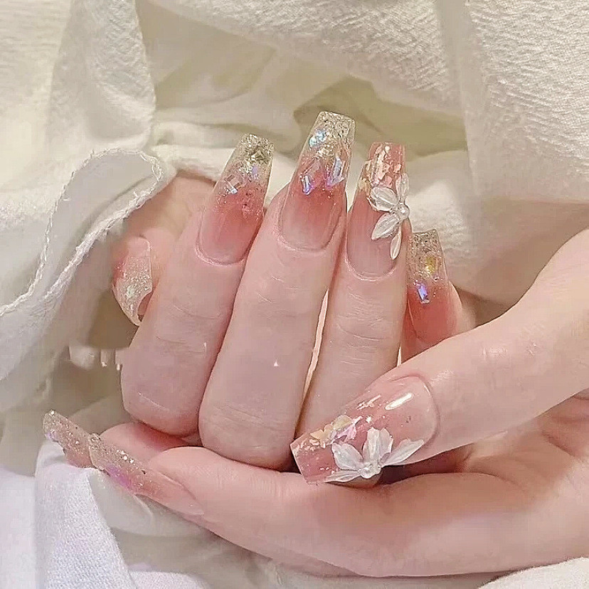 อบอุ่นเอลฟ์น้ําแข็งดอกไม้ร้อนขายสีขาวส่องไฟมือวาดฤดูใบไม้ผลิเล็บสติ๊กเกอร์ที่ทําด้วยมือสวมใส่เล็บผลิตภัณฑ์สําเร็จรูปขายส่ง