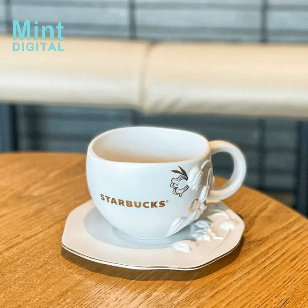 สตาร์บัคส์ ชุดถ้วยและจานรอง300มิลลิลิตรแก้วเซรามิกนูนลิลลี่ที่สง่างามของหุบเขาสีขาวบริสุทธิ์ที่เรียบง่ายถ้วยกาแฟเซรามิกถ้วยน้ํา