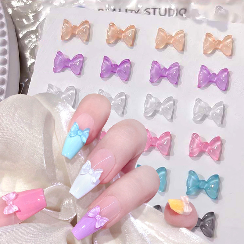 50 ชิ้นผสม Mocha Macaron น้ําแข็งเล็บโปร่งใส Bowknot Shiny Nail Art DIY อุปกรณ์เสริม
