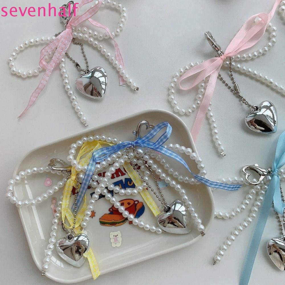 จี้กระเป๋าโบว์ เจ็ด,หัวใจเลียนแบบมุกโบว์โทรศัพท์โซ่,เสน่ห์มุกโบว์ลูกปัดโซ่โทรศัพท์เชือกเส้นเล็กจี้หัวใจพวงกุญแจเลดี้