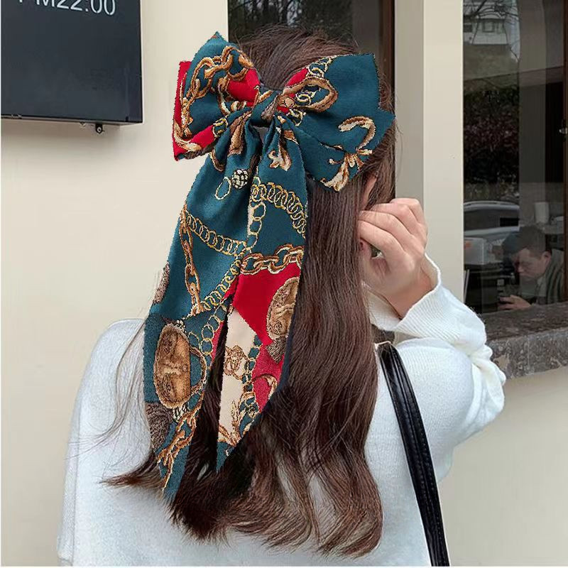 Influencer Bow Retro ขนาดใหญ่ยาวลอย Headdress