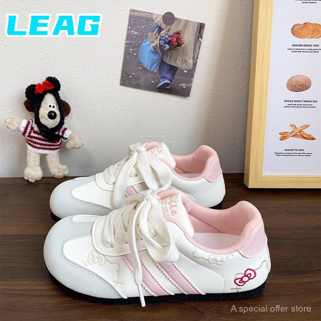 รองเท้าฝึกซ้อมเยอรมันปักลายแมว KT น่ารัก LEAG Lan Jue รองเท้าผู้หญิงแบบสบาย