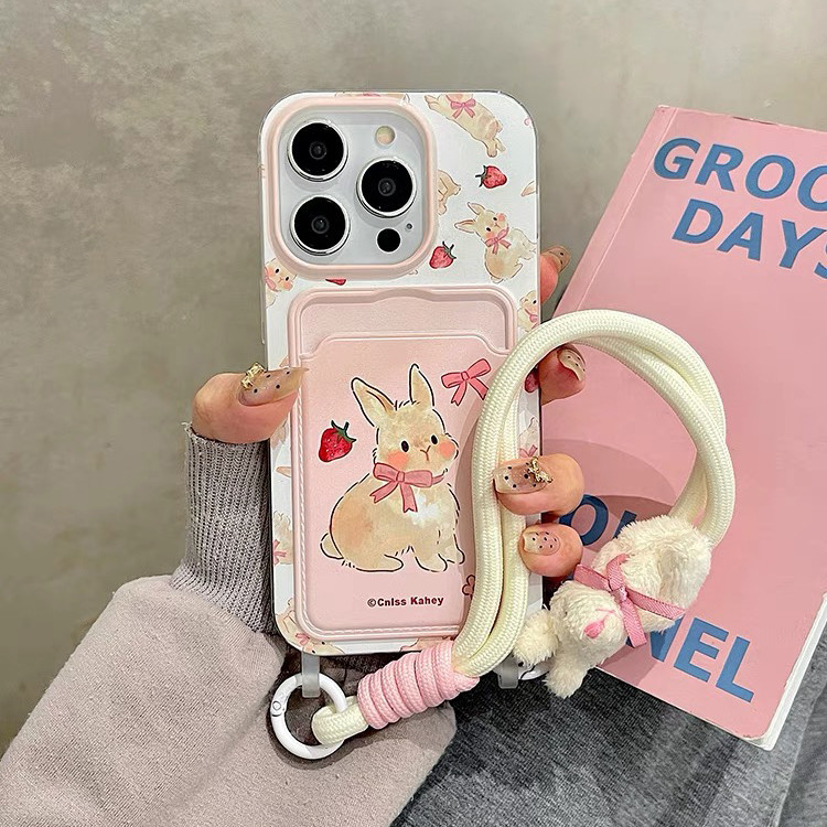 โบว์กระต่ายสตรอเบอร์รี่กระต่ายสายรัดข้อมือไอโฟน15เคสโทรศัพท์เหมาะสําหรับแอปเปิ้ล14/13โปรแม็กซ์กระเป๋าบัตรใส่การ์ด12เคสนิ่ม11โซ่เชือกแขวนสาวหัวใจน่ารักใ