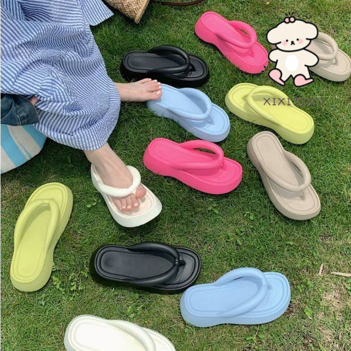 Xitiao Flip-Flops ผู้หญิงสวมใส่กลางแจ้งแฟชั่นอึก้าวกันลื่นหนา