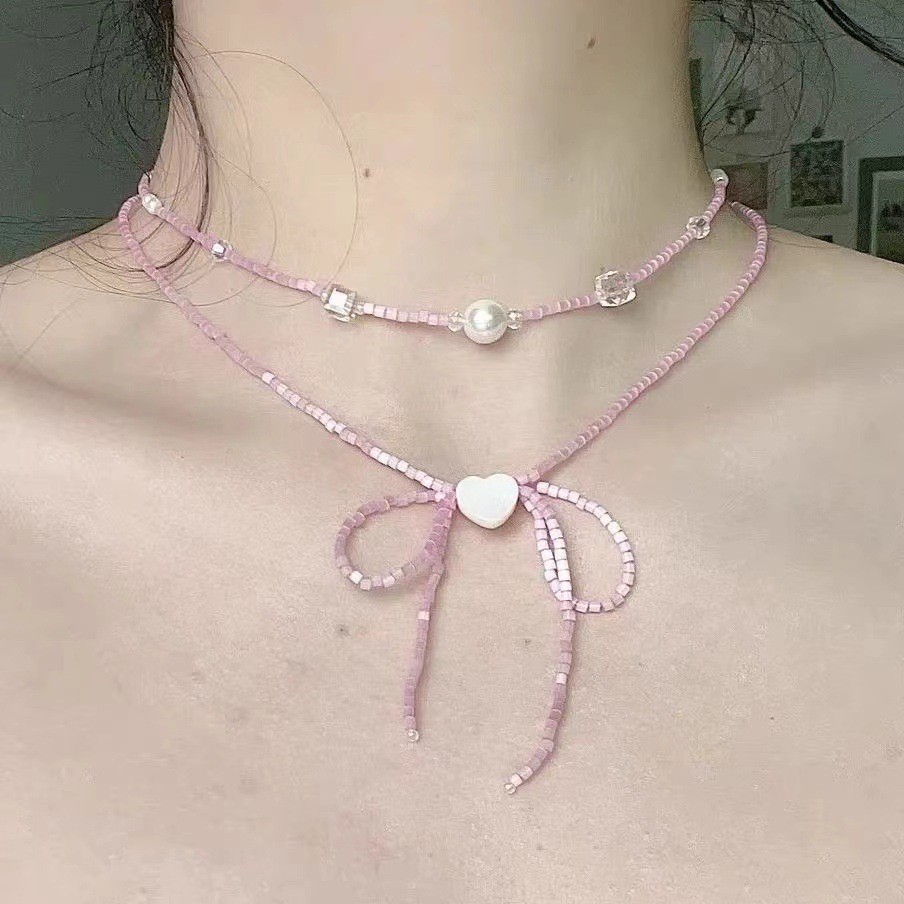 สร้อยคอลูกปัด   รูปหัวใจ ไข่มุก โบว์    สร้อยคอแฟชั่น  มีให้เลือกหลายสี