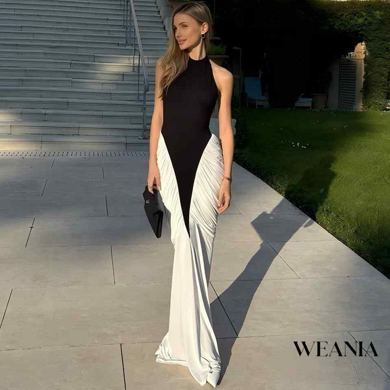 WANIA กระโปรงปาร์ตี้ฤดูร้อน สไตล์เซ็กซี่ คอกุยด้วน halter พร้อมลายพิมพ์ตัดกันและทรงเพรียว