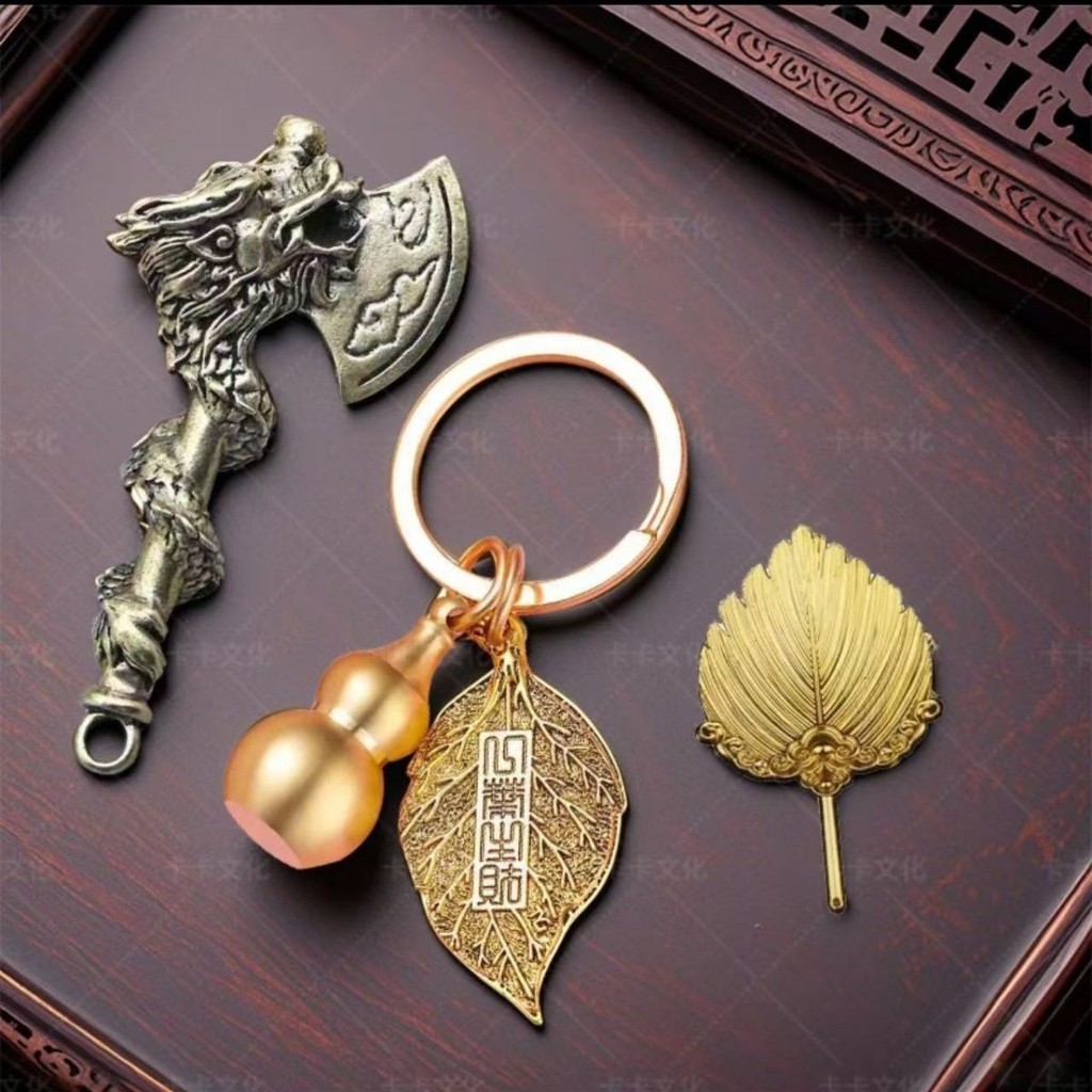 Petunia Heart Face Face Face Stick Stick Stick Stick พวงกุญแจจี้ Stick Axe Pu Maple Leaf พวงกุญแจจี้