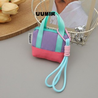 กระเป๋าใส่เหรียญสีชมพูแบบมินิ พร้อมสายรัดข้อมือ