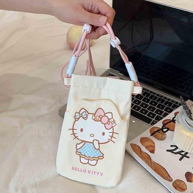 Hello Kitty Halter Bag กระเป๋าใส่มือถือและเหรียญ การ์ตูน.Crossbody ออกแบบป้องกันหายและปลอดภัย เหมาะสำหรับใช้งานในวันธรรมดาหรืองานเลี้ยง - รูปที่ 5