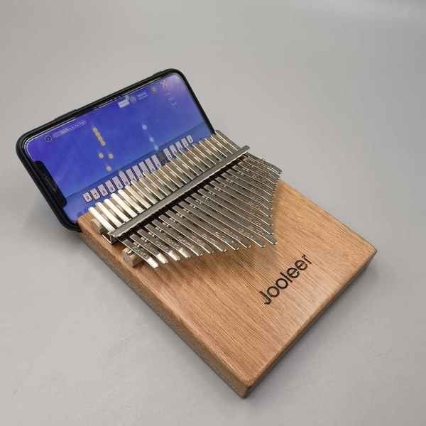 กล่องดนตรี เปียโนมือสองที่ชํารุด Zhile Kalimba นิ้วหัวแม่มือเปียโนนั้นง่ายและง่ายต่อการเรียนรู้เด็กช