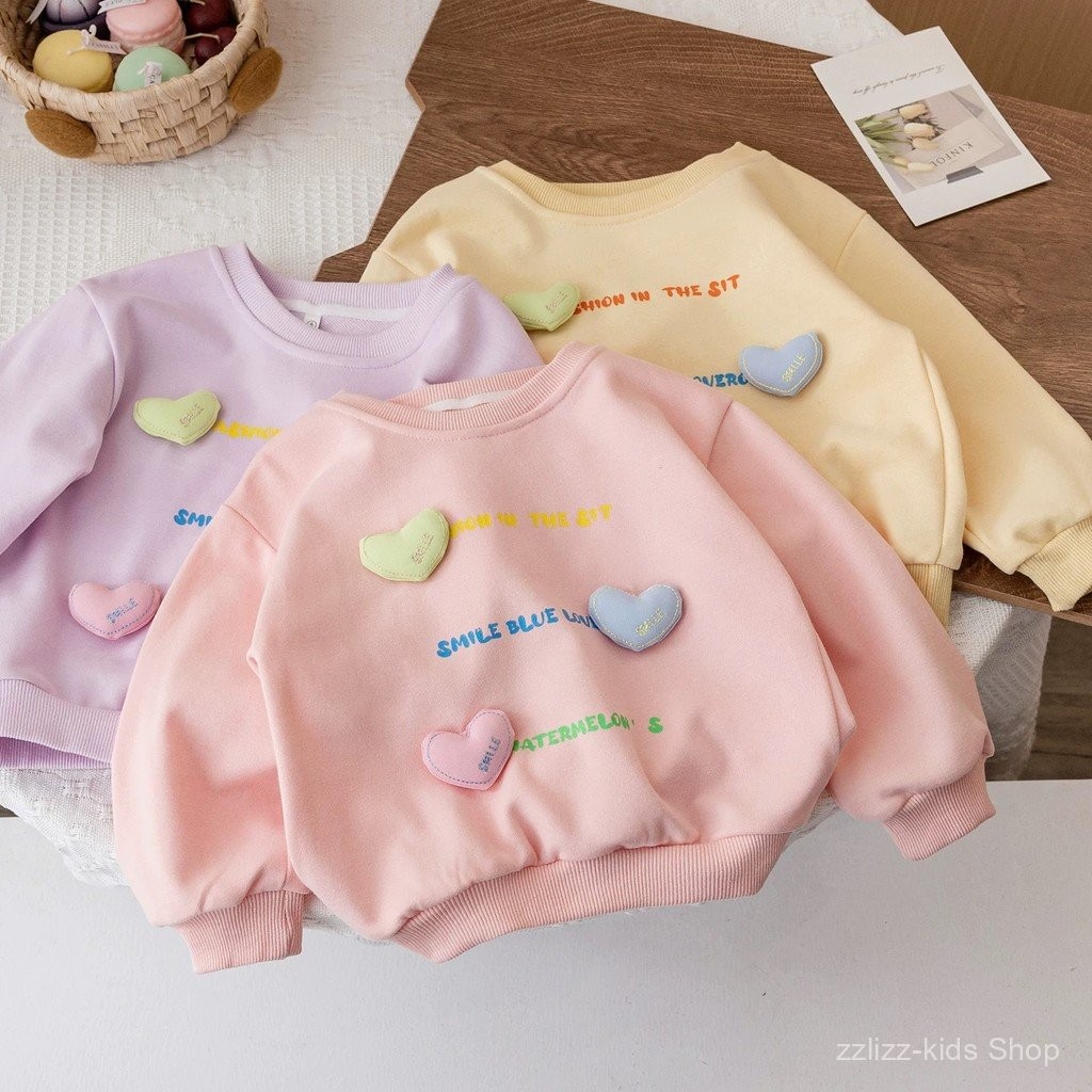 เสื้อสเวตเตอร์เด็กผู้หญิงแบบใหม่เสื้อสวมหัวรักสไตล์ตะวันตกฤดูใบไม้ผลิและฤดูใบไม้ร่วงแฟชั่นสไตล์เกาหลีสำหรับเด็กขนาดเล็กและขนาดกลางแฟชั่น