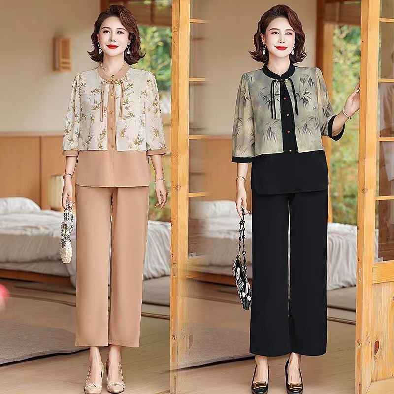 แฟชั่นใหม่ สไตล์จีนใหม่ ชุดเซ็ต 2 ชิ้น เสื้อคุณแม่+กางเกง ใส่สวยดูดี,เสื้อแขนสั้นลายดอกไม้ มันดูแพงนะ รูปแบบใหม่ แฟชั่น