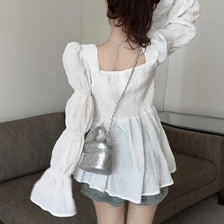 เสื้อแขนยาวแต่งอกทรงขนมชั้น น่ารักมาก สม็อกหลังยืดได้เยอะ รุ่นกระดุมแต่ง ผ้าชีฟองบาง ทรงสวยเข้ารูป แฟชั่นเกาหลี