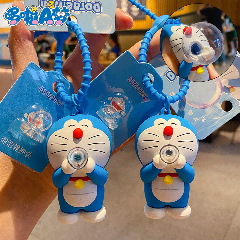 ของแท้โดราเอมอนเป่าฟองพวงกุญแจ/น่ารักทิงเกอร์เบลล์ตุ๊กตาแมวจี้ของขวัญขนาดเล็ก