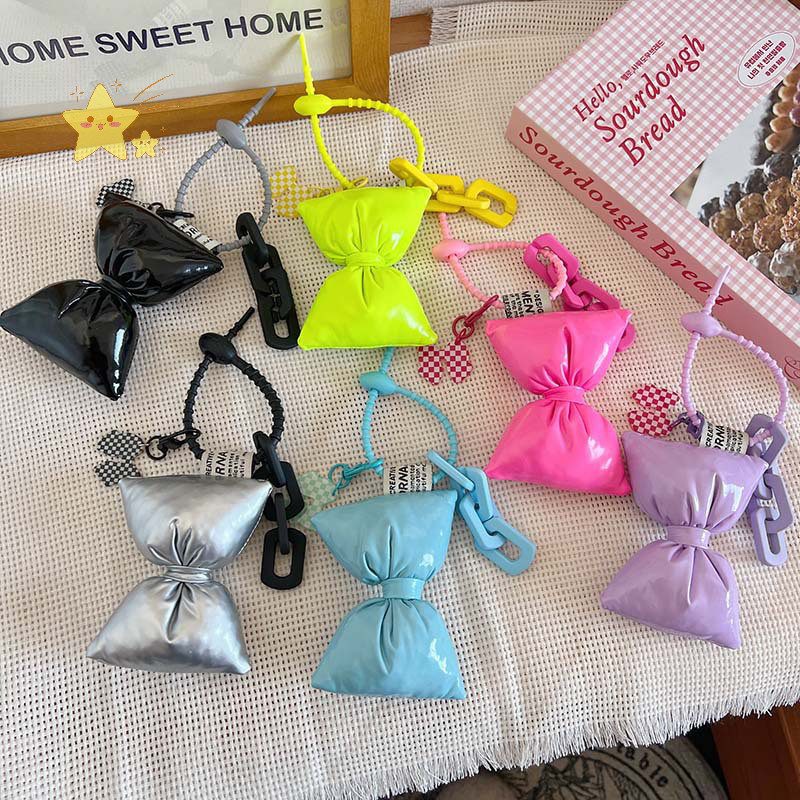 [JBTH] หนังผ้าฝ้ายที่เต็มไปด้วยโบว์พวงกุญแจจี้หวาน Bowknot พวงกุญแจจี้อเนกประสงค์แฟชั่นกระเป๋าเป้สะพายหลังอุปกรณ์ตกแต่ง [JB]