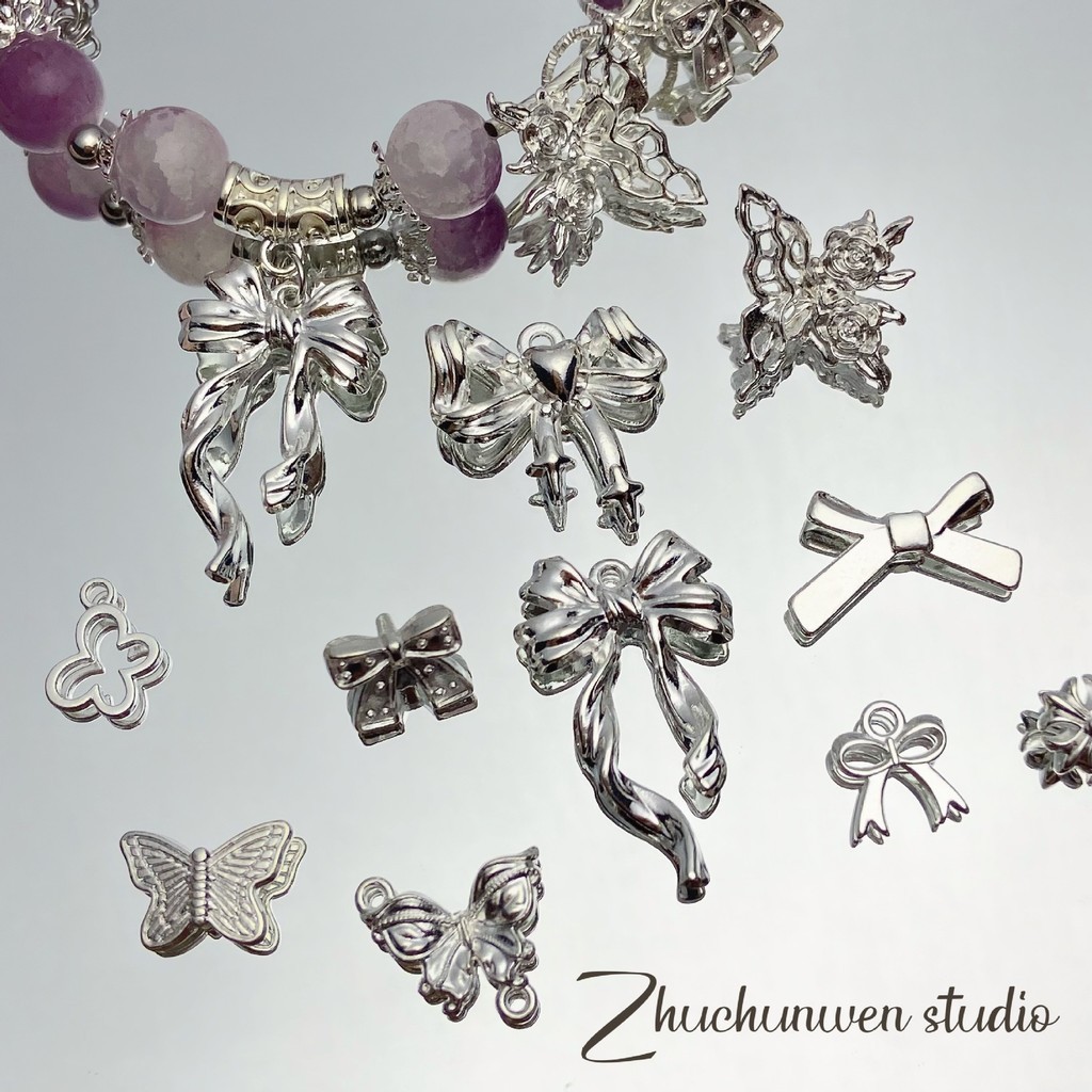 10 ชิ้นของเสน่ห์ผีเสื้อโลหะใหม่ สีเงิน ลูกปัดโบว์ DIY วัสดุทำสร้อยข้อมือ สร้อยคอ เครื่องประดับ ลูกปัดหลวม อุปกรณ์เสริม